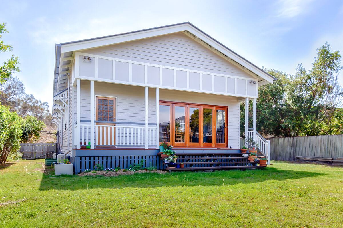 House renovation including deck steps ballustrades roofing and extension