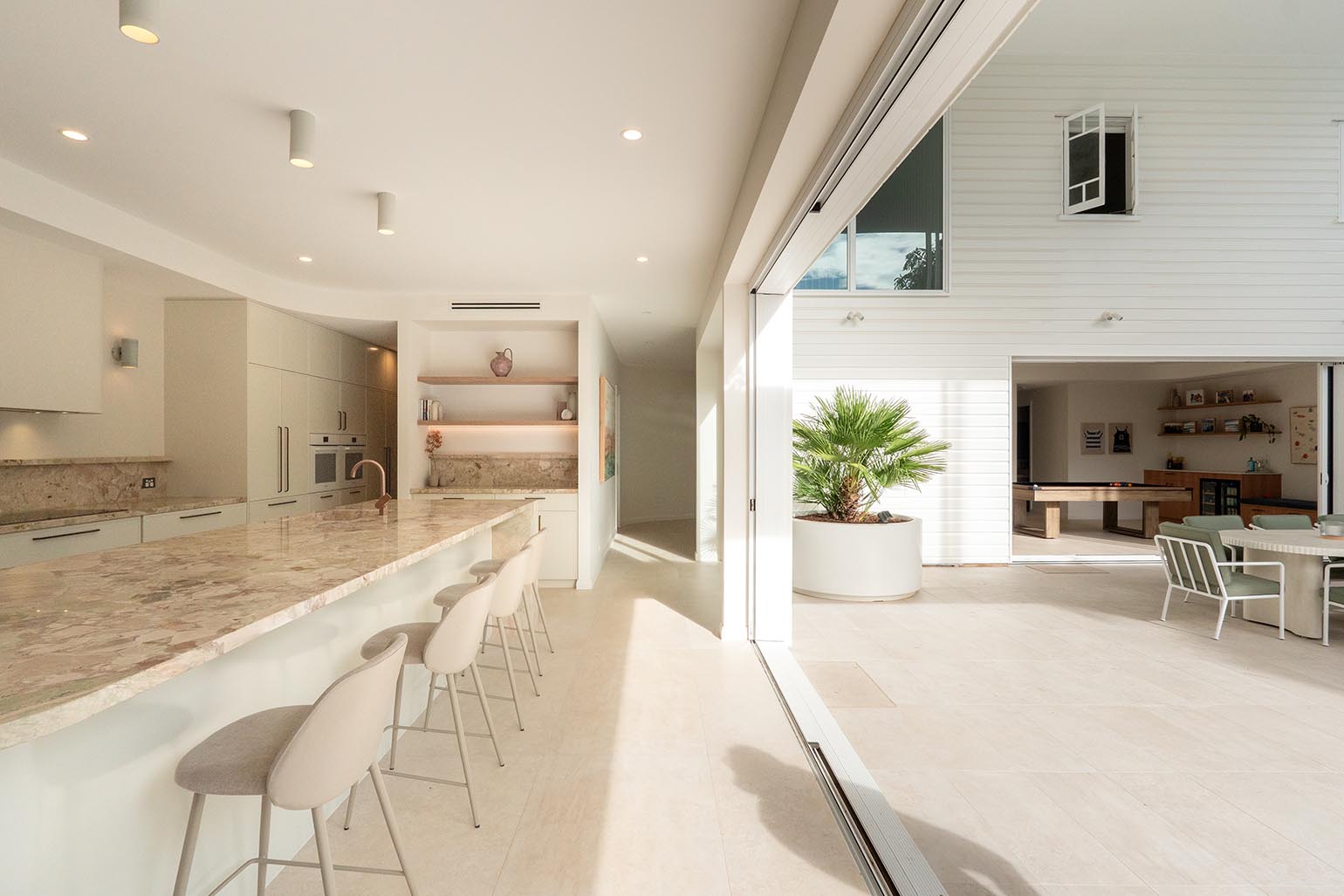 Ascot kitchen opening to outdoor entertaining area